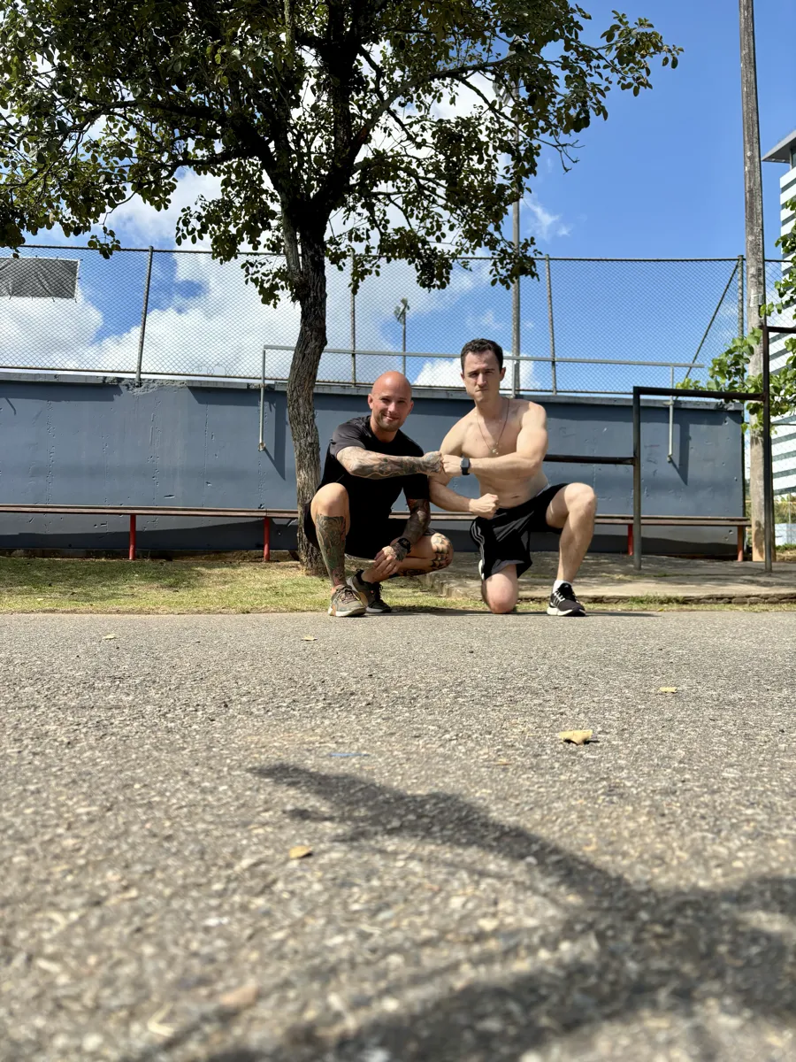 Coach and coachee training together outdoors